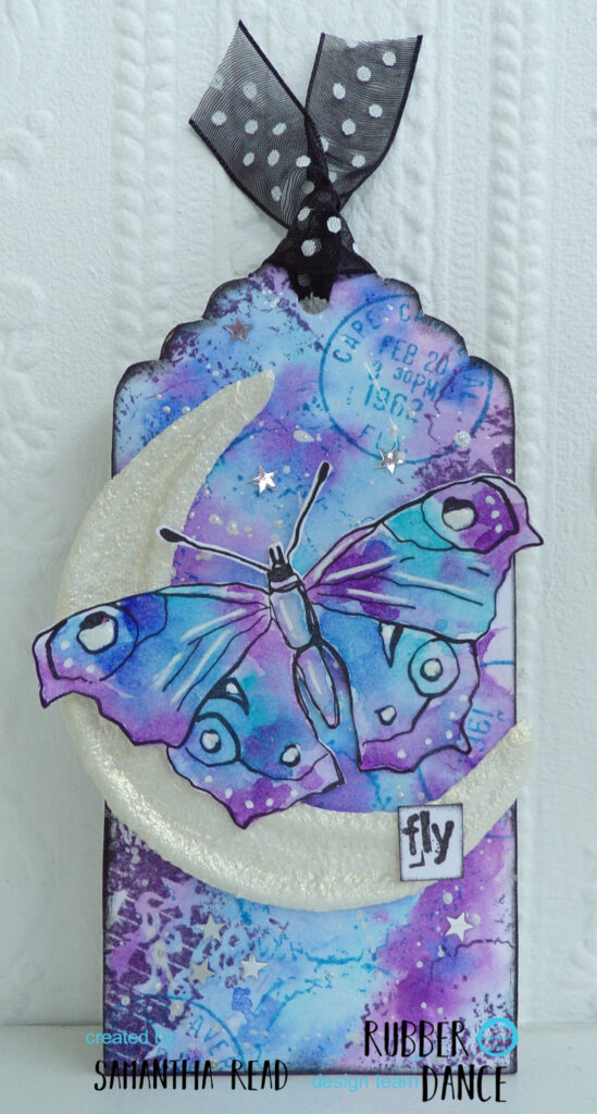 mixed media tag with butterfly stamp