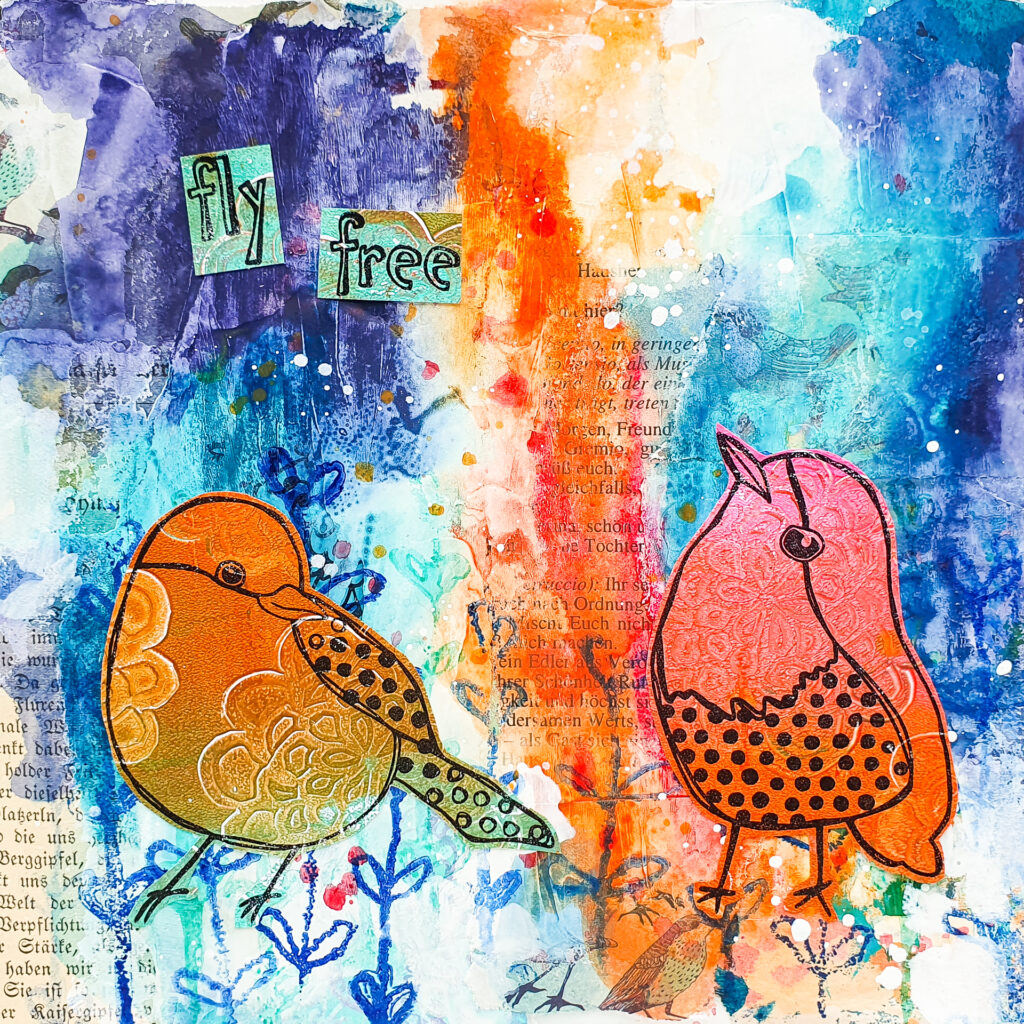 mixed media art journal page with bird stamps